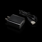 USB-C cable with wall power adapter on black