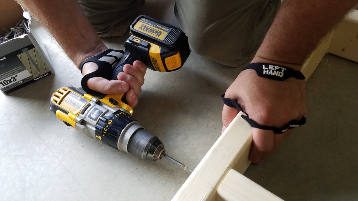 Palm Protectors worn bare while driving screws into a 2x4 frame with a drill